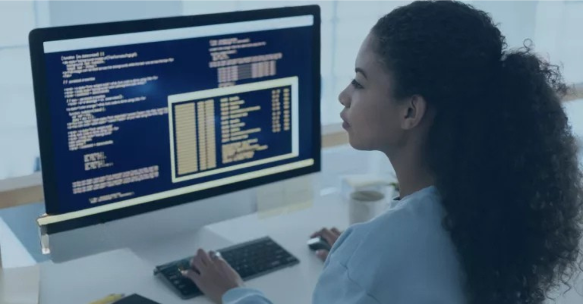 A woman works at an encrypted computer