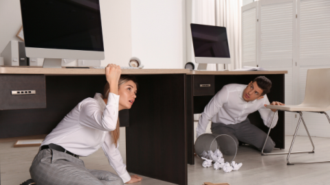 Employees hiding under desks