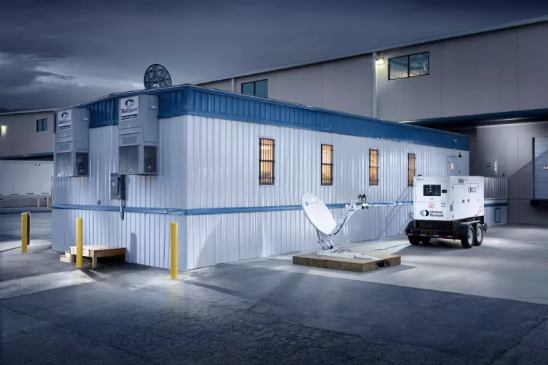 Agility temporary workspace with satellite dish and generator