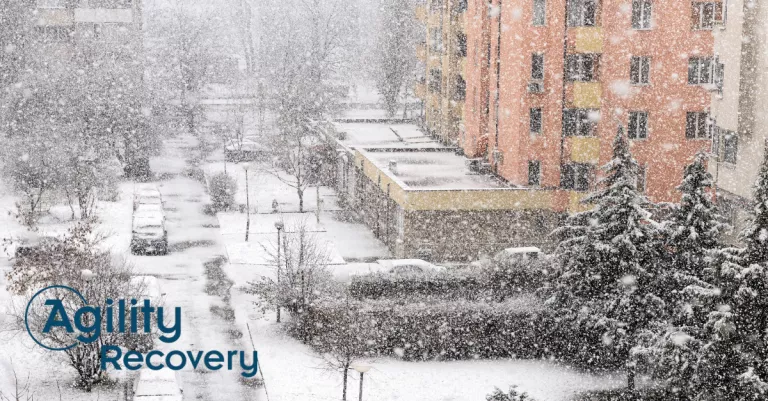 snow over a city