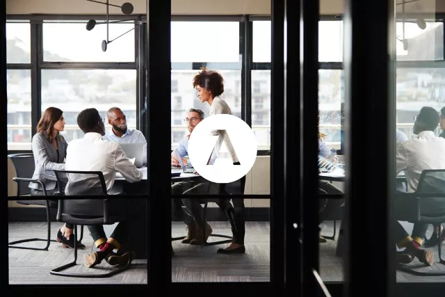 Group of people working together in an office