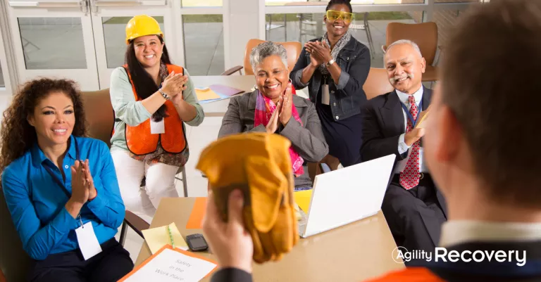 Group of workers happy in a meeting