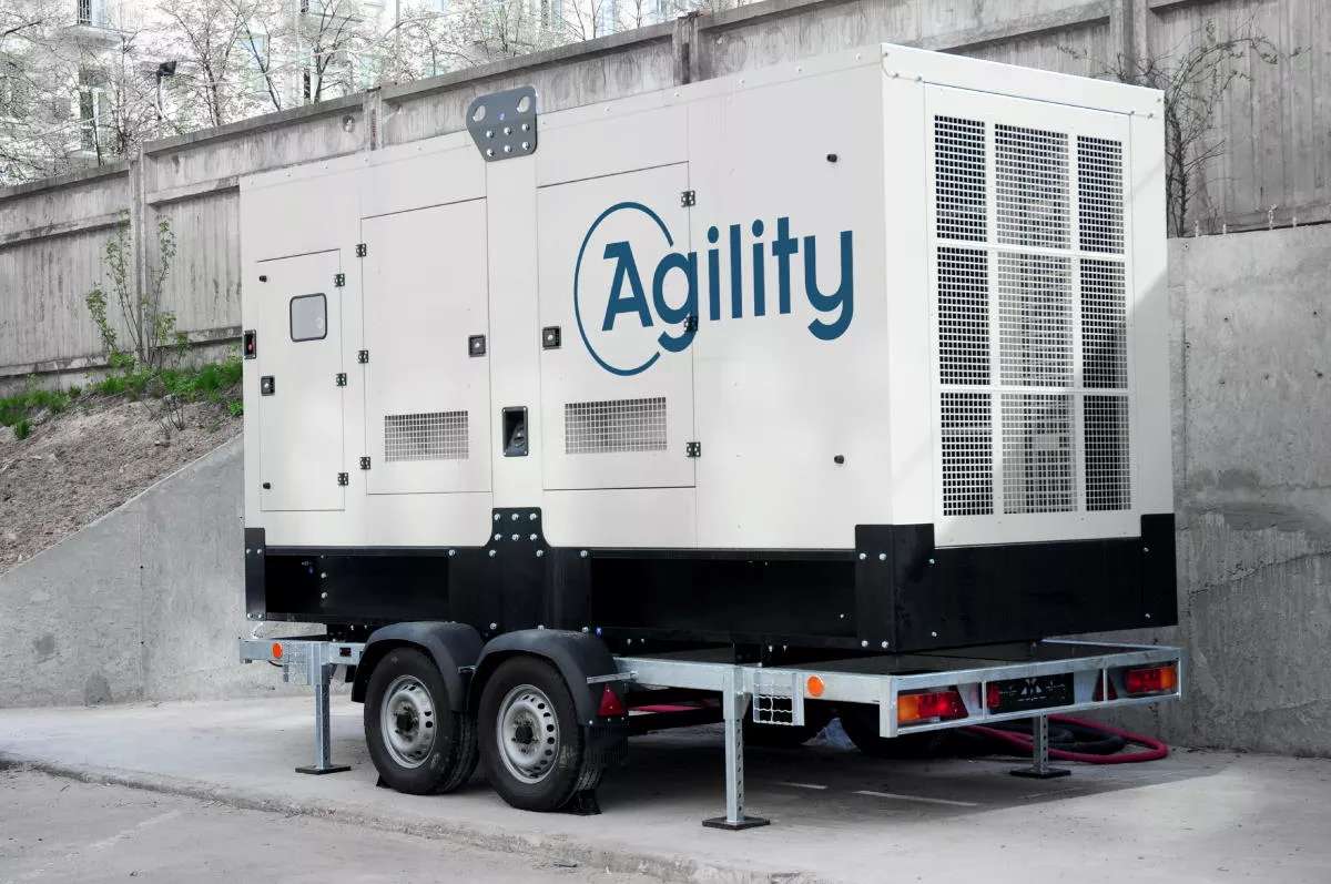 Commercial backup generator deployed at a business during a power outage