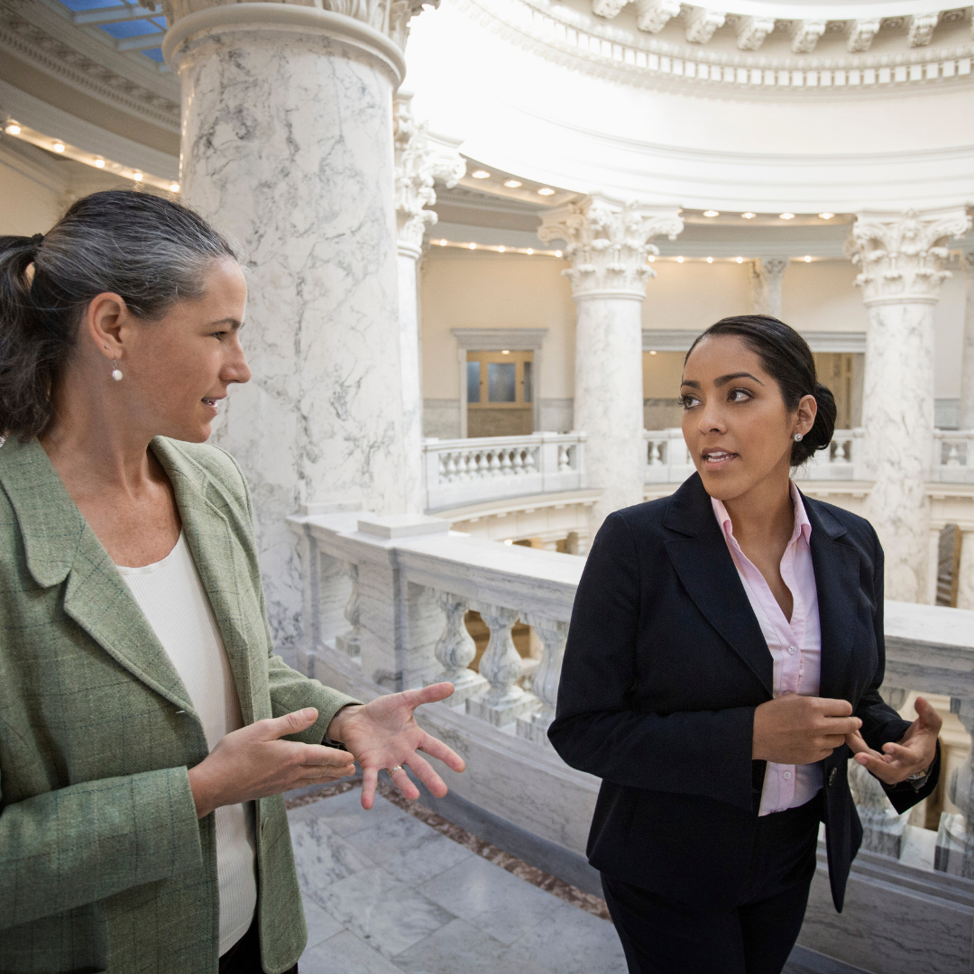 Two public sector employees at the Capitol building
